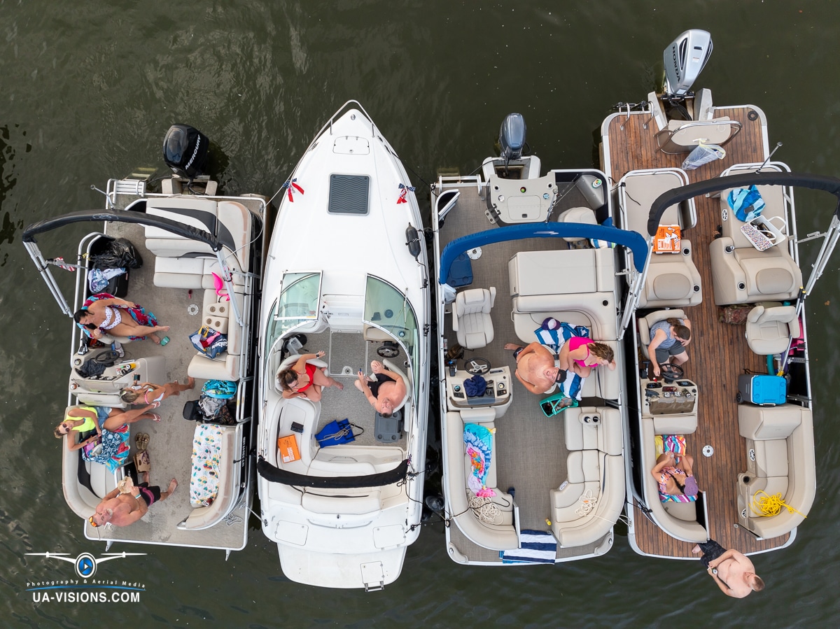 Aerial view of leisure boats clustered on the Kanawha River during the Regatta.