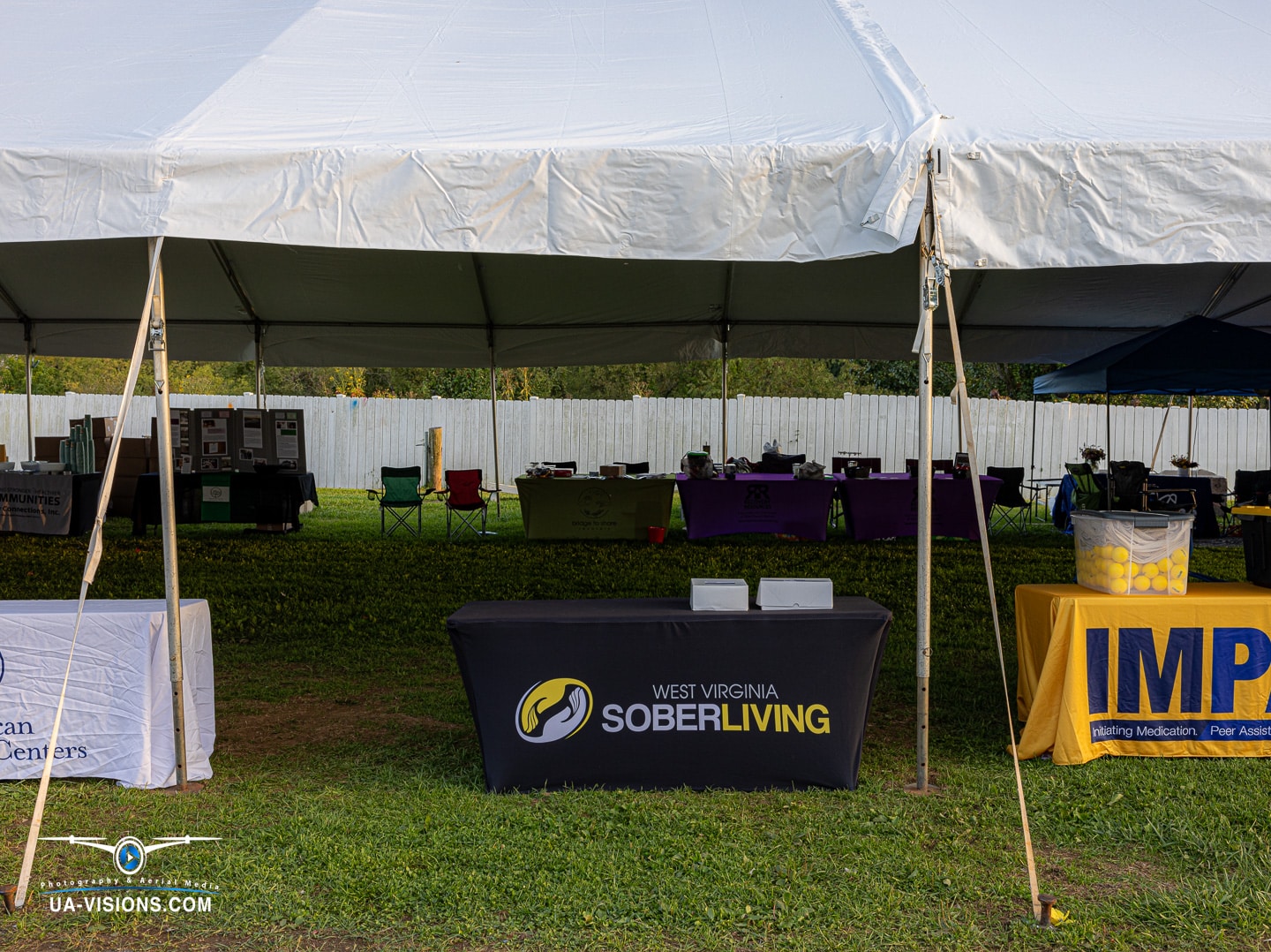 Tent showcasing West Virginia Sober Living at Healing Appalachia, a beacon of support.