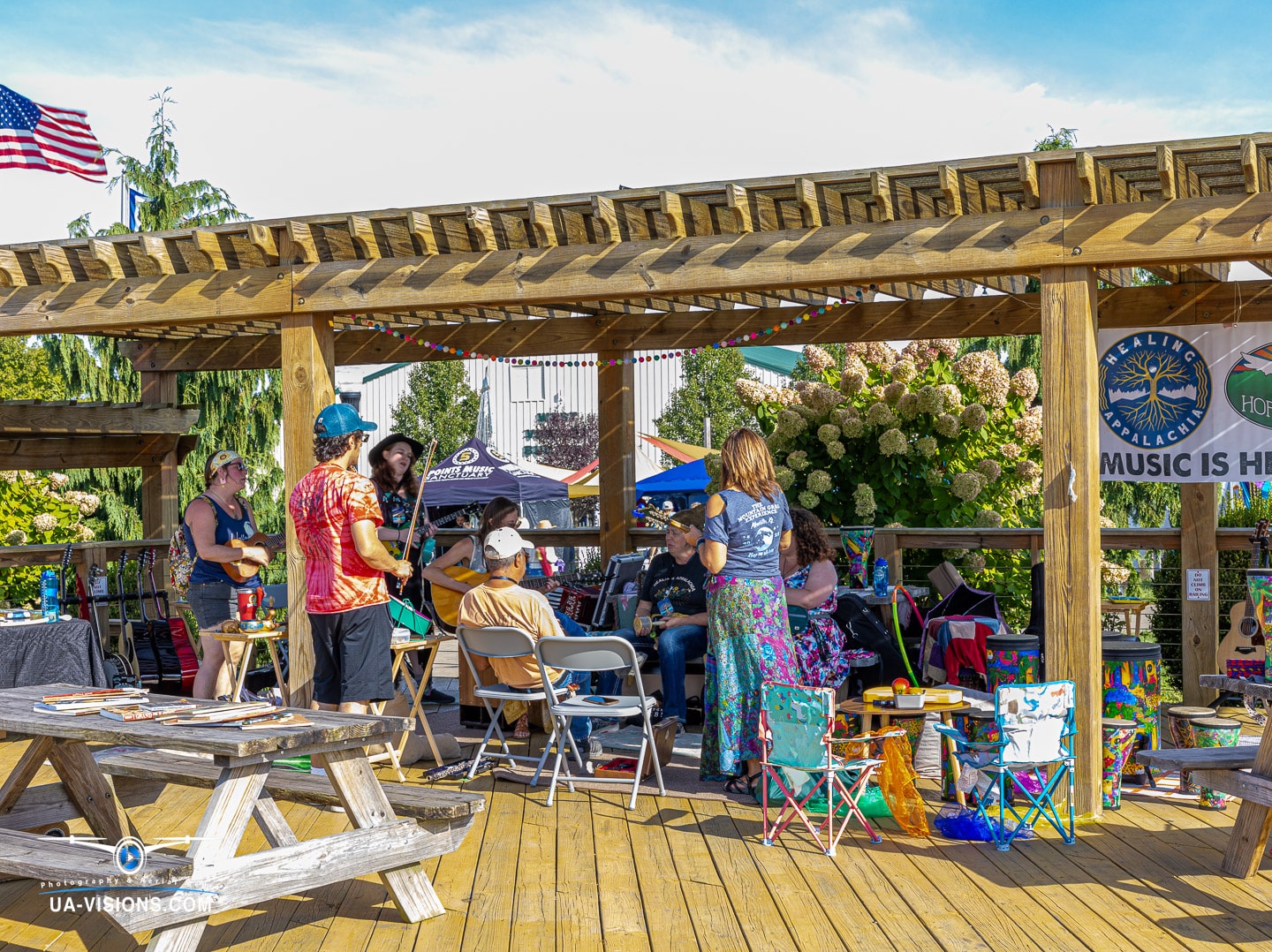 Laid-back festival life on the deck, where every chair has a story at Healing Appalachia.