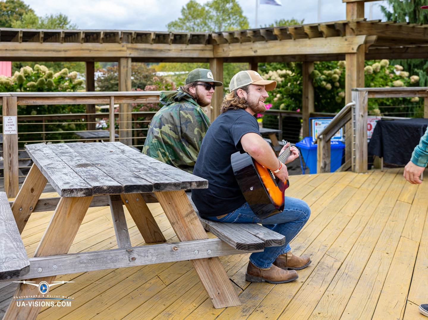 A candid moment of music and musings on the deck at Healing Appalachia.