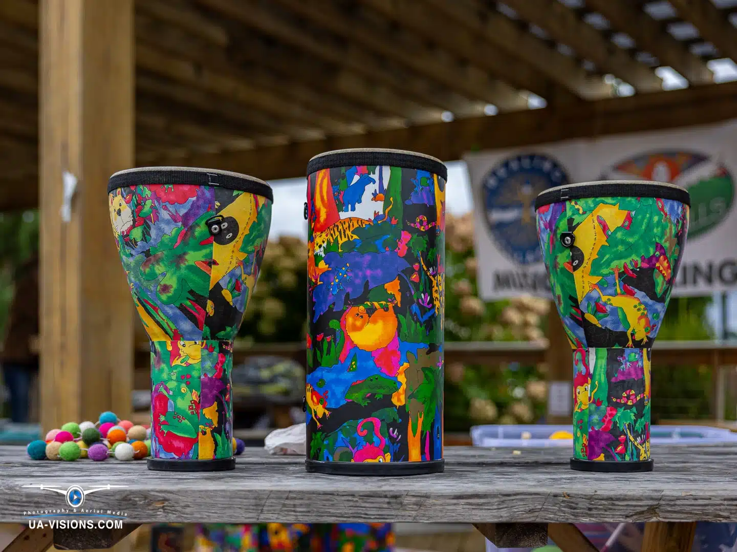 Colorful djembe drums on display, adding a beat to the visual melody of Healing Appalachia.
