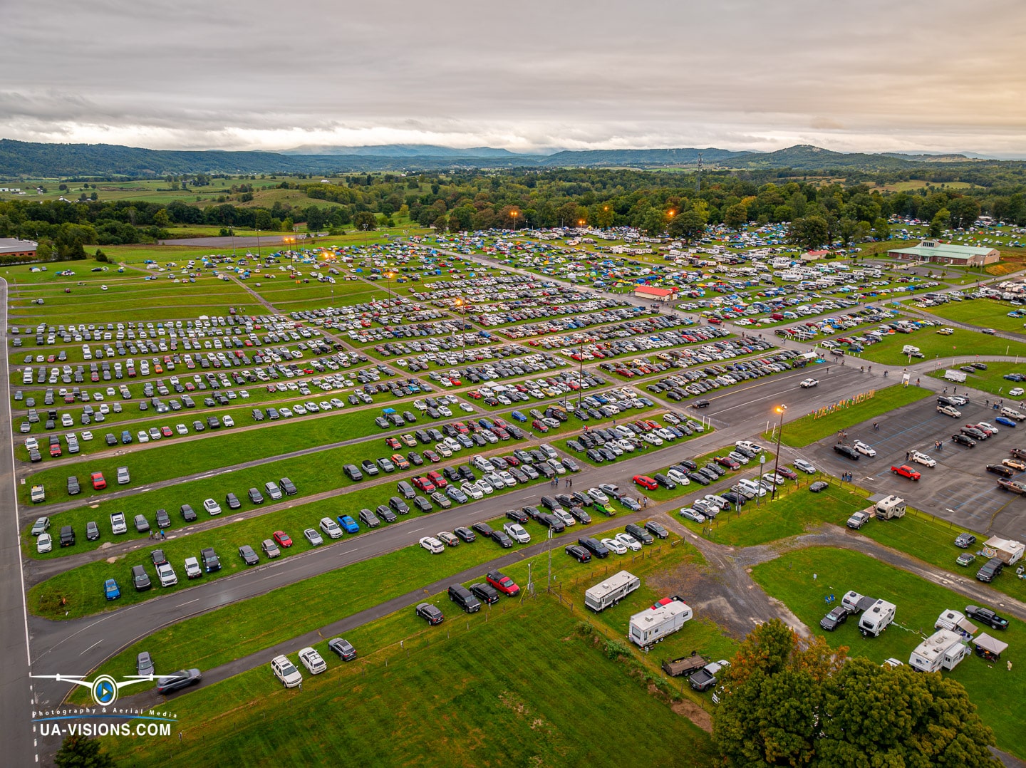 Aerial snapshot of sprawling festival parking at Healing Appalachia, a grid of adventure beginnings.