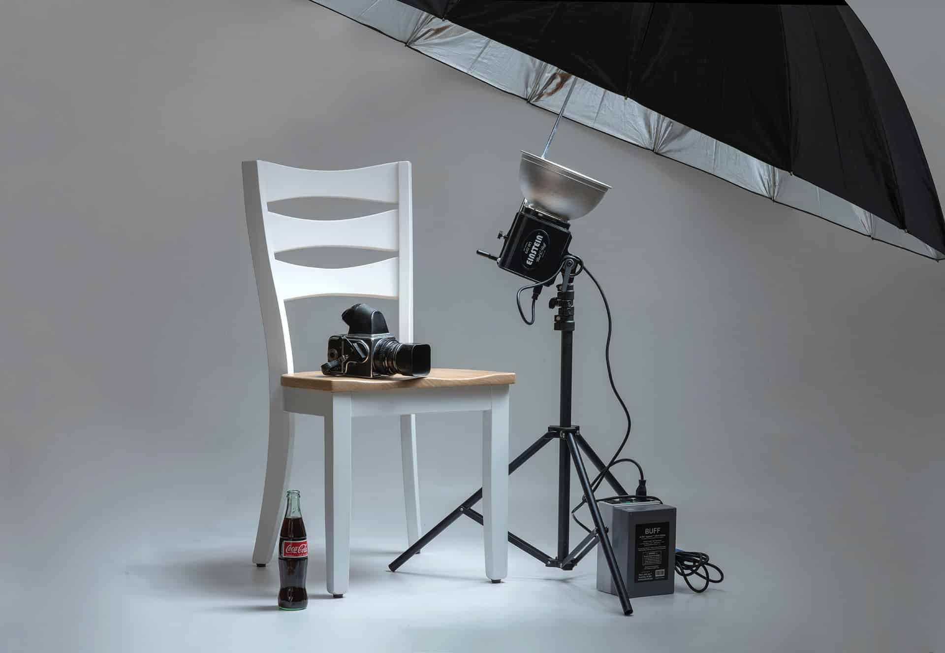 Professional portrait photography collections studio setup with vintage camera and lighting by UA-Visions in Charleston, WV.
