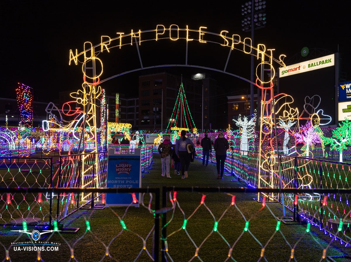 UA-Visions presents a delightful take on the North Pole with a sports-themed light installation at Charleston's Light the Night. This vibrant image showcases the joy and creativity of holiday displays.