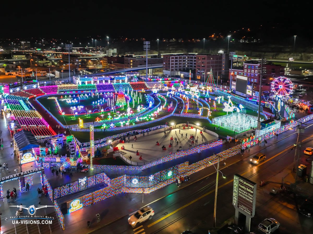 UA-Visions highlights Charleston's holiday grandeur from the skies. This image encapsulates the joyous atmosphere at GoMart Ballpark with its myriad of lights, offering a glimpse into the quality visual content for any occasion.