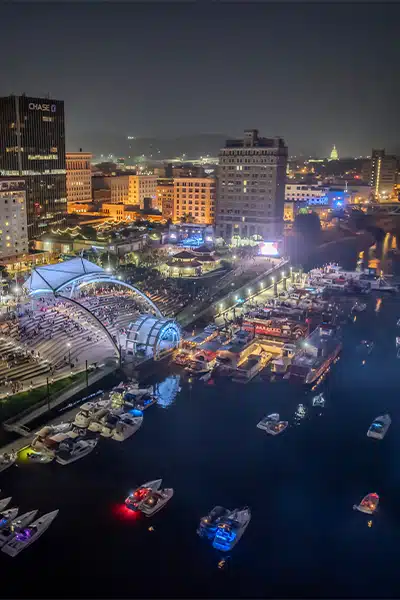 Nighttime aerial shot of the Charleston Sternwheel Regatta, showcasing UA-Visions' event photography prowess.