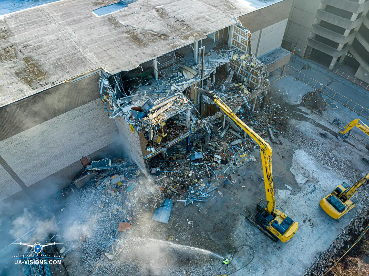 Aerial view of a demolition progression project of the Sears building at the Charleston Town Center Mall captured by UA-Visions